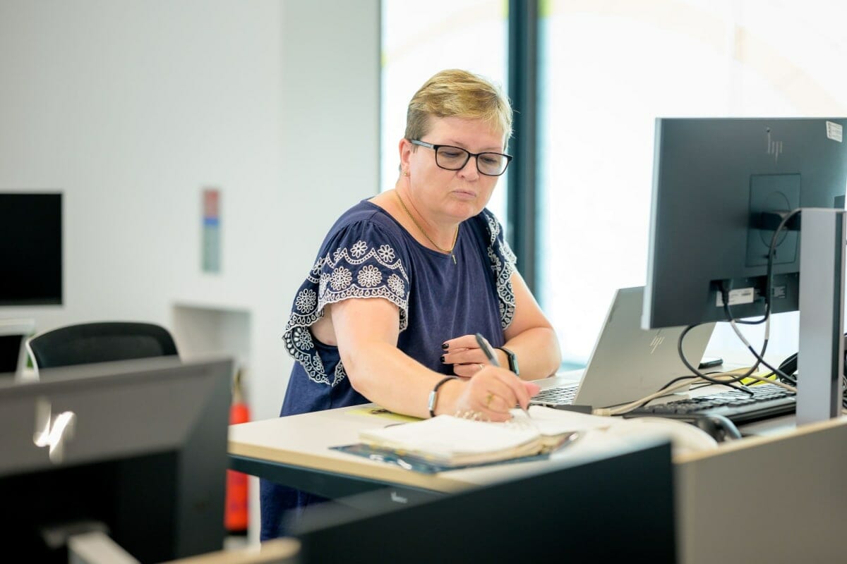 Business owner going through her year-end bookkeeping checklist